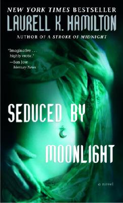 Livre Seduced by Moonlight - Laurell K. Hamilton (Livre d'occasion) - ISBN 034544356X